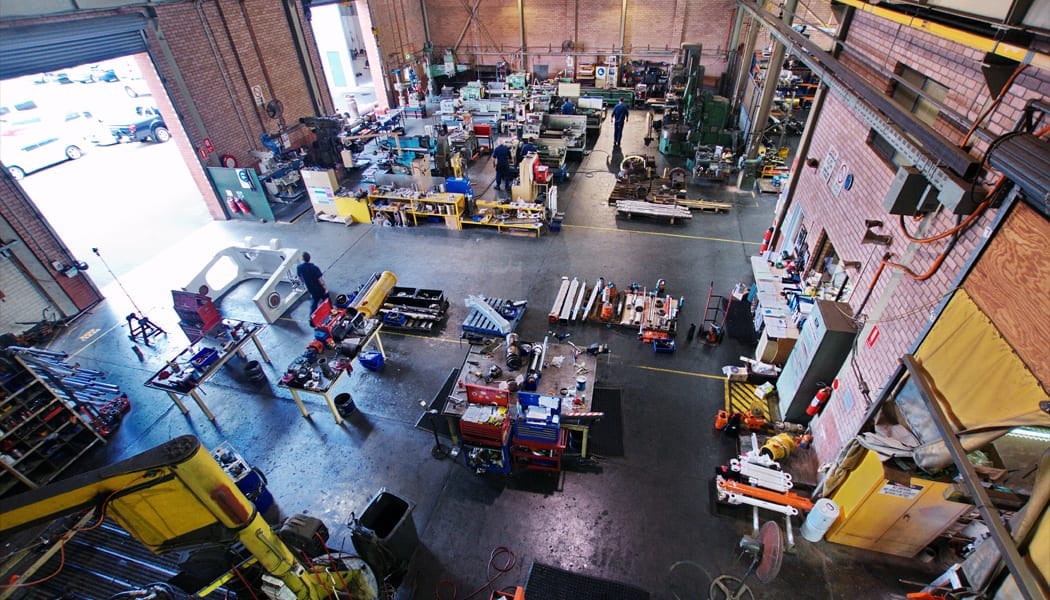 a picture of a busy hydraulic cylinder workshop